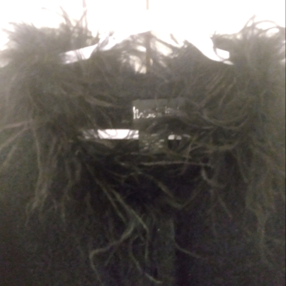 Black sweater with feathered collar